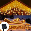 Solar Schneeflocken-Lichtervorhang | 3,5 oder 7 m, 8 Leuchtmodi, warmweiss oder bunt, Dämmerungsautomatik, IP44 | Weihnachtsbeleuchtung für Dachrand, Fassade, Balkon & Garten